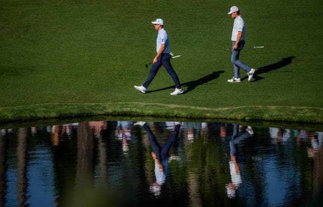 260409 Corey Conners of Canada and Michael Brennan of the United States during the first round of the 2026 Masters Golf Tournament on April 9, 2026 in Augusta. Photo: Petter Arvidson BILDBYRAN kod PA PA1193 golf masters bbeng the masters augusta Copyright: PETTERxARVIDSON BB260409PA368