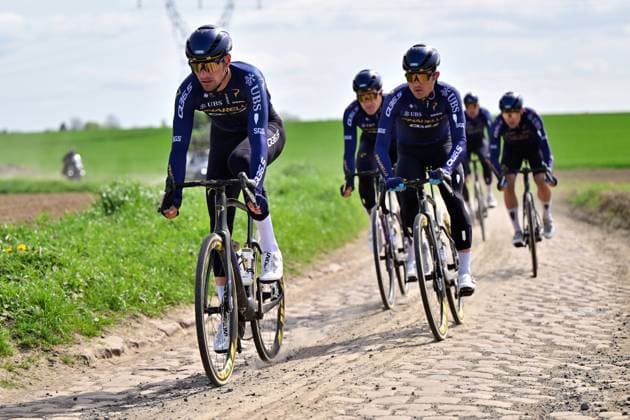 Pinarello Q36.5 Pro Cycling Team riders pictured in action during the reconnaissance of the track ahead of this year s Paris-Roubaix cycling race, Friday 10 April 2026, around Roubaix, France. The 123rd edition of Paris-Roubaix cycling races will take on Sunday, with the women riding 143,1 km the men riding 258,3 km on Sunday. DIRKxWAEM  x170380882x