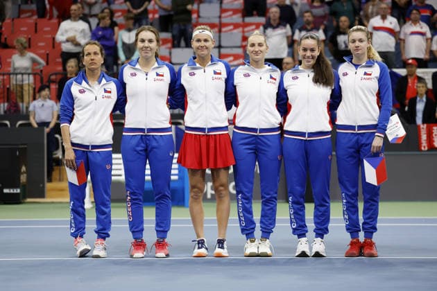 Players of the Czech national tennis team in the Billie Jean King Cup Barbora Strycova (non-playing captain), Linda Noskova, Marie Bouzkova, Marketa Vondrousova, Tereza Valentova, Lucie Havlickova pose for team photo prior to the Switzerland vs. Czech Republic match, Biel, Switzerland, April 10, 2026. (CTKxPhoto PavelxLebeda) CTKPhotoF202604100013601  CTKPhotoF202604100013601