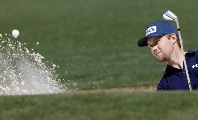 Golf 2026 Masters Tournament - Round 2 Rasmus Neergaard-Petersen of Denmark hits a shot from a bunker on Hole 2 in Round 2 of the 2026 Masters tournament in August, Georgia, USA, 10 April 2026. Augusta United States  Copyright: xERIKxS.xLESSERx