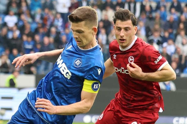 10.04.2026, xrekx, Fussball 2.Bundesliga, Karlsruher SC - Arminia Bielefeld v.l. Marvin Wanitzek (Karlsruher SC) Stefano Russo (Arminia Bielefeld) Zweikampf, Aktion, action, battle for the ball (DFL DFB REGULATIONS PROHIBIT ANY USE OF PHOTOGRAPHS as IMAGE SEQUENCES and or QUASI-VIDEO) Karlsruhe *** 10 04 2026, xrekx, Fußball 2 Bundesliga, Karlsruher SC Arminia Bielefeld v l Marvin Wanitzek Karlsruher SC Stefano Russo Arminia Bielefeld Zweikampf, Aktion, action, battle for the ball DFL DFB REGULATIONS PROHIBIT ANY USE OF PHOTOGRAPHS as IMAGE SEQUENCES and or QUASI VIDEO Karlsruhe