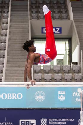 DOBRO FIG Apparatus World Cup Osijek 2026 Qualifications Alfred Schwaiger of Austria performs on the parallel bars during the DOBRO FIG Apparatus World Cup Osijek 2026 Qualifications at Sports Hall Gradski vrt on April 10, 2026. in Osijek, Croatia.  DavorxJavorovic PIXSELL