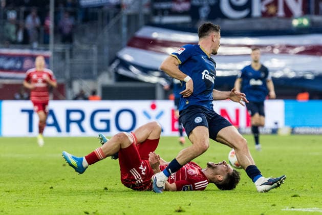 2. Fussball Bundesliga: Fortuna Düsseldorf 1895 - Holstein Kiel; 10.04.2026 Zweikampf Florent Muslija (Fortuna Düsseldorf, 24) - Verletzung, Adrian Kapralik (Holstein Kiel, 20) 2. Fussball Bundesliga, Fortuna Düsseldorf 1895 - Holstein Kiel, Düsseldorf, Merkur Spiel-Arena am 10.04.2026 DFL REGULATIONS PROHIBIT ANY USE OF PHOTOGRAPHS AS IMAGE SEQUENCES AND OR QUASI-VIDEO. *** 2 Soccer Bundesliga Fortuna Düsseldorf 1895 Holstein Kiel 10 04 2026 duel Florent Muslija Fortuna Düsseldorf, 24 injury, Adrian Kapralik Holstein Kiel, 20 2 Soccer Bundesliga, Fortuna Düsseldorf 1895 Holstein Kiel, Düsseldorf, Merkur Spiel Arena on 10 04 2026 DFL REGULATIONS PROHIBIT ANY USE OF PHOTOGRAPHS AS IMAGE SEQUENCES AND OR QUASI VIDEO Copyright: xBEAUTIFULxSPORTS Wunderlx