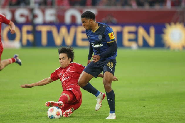 10.04.2026, Fussball, Saison 2025 2026, 2. Bundesliga, 29. Spieltag, Fortuna Duesseldorf - Holstein Kiel, v. l. Düsseldorfs Satoshi Tanaka, Ikem Ugoh (Holstein Kiel) Düsseldorf Merkur-Spiel Arena NRW Deutschland xRHR-FOTOx *** 10 04 2026, Football, Season 2025 2026, 2 Bundesliga, Matchday 29, Fortuna Duesseldorf Holstein Kiel, f l Düsseldorfs Satoshi Tanaka, Ikem Ugoh Holstein Kiel Düsseldorf Merkur Spiel Arena NRW Germany xRHR FOTOx Copyright: RHR-FOTOx RHR-FOTO