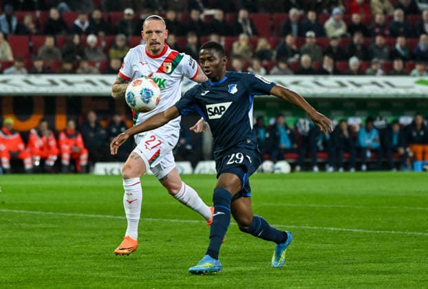 10.04.2026, xemx, Fussball 1.Bundesliga, FC Augsburg - TSG Hoffenheim v.l. Marius Wolf (FC Augsburg), Bazoumana Toure (TSG Hoffenheim) (DFL DFB REGULATIONS PROHIBIT ANY USE OF PHOTOGRAPHS as IMAGE SEQUENCES and or QUASI-VIDEO) Augsburg *** 10 04 2026, xemx, Soccer 1 Bundesliga, FC Augsburg TSG Hoffenheim v l Marius Wolf FC Augsburg , Bazoumana Toure TSG Hoffenheim DFL DFB REGULATIONS PROHIBIT ANY USE OF PHOTOGRAPHS as IMAGE SEQUENCES and or QUASI VIDEO Augsburg