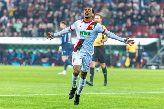 Torjubel, jubelt nach seinem Treffer zum 1:0 von Alexis Claude-Maurice (FC Augsburg), FC Augsburg vs. VfB Stuttgart, Fussball, 1. Bundesliga, 27. Spieltag, 22.03.2026 DFB regulations prohibit any use of photographs as image sequences and or quasi-video *** Goal celebration, cheers after his goal to 1 0 by Alexis Claude Maurice FC Augsburg , FC Augsburg vs VfB Stuttgart, Soccer, 1 Bundesliga, 27 Matchday, 22 03 2026 DFB regulations prohibit any use of photographs as image sequences and or quasi video Copyright: xkolbert-press PeterxFastlx