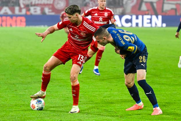 v. li. im Zweikampf Cedric Itten (Duesseldorf 13) David Zec (Kiel 26) 10.04.2026 ¢ Fussball ¢ Fortuna Duesseldorf vs Holstein Kiel, Merkur Spiel-Arena, Duesseldorf, DFB DFL REGULATIONS PROHIBIT ANY USE OF PHOTOGRAPHS AS IMAGE SEQUENCES AND OR QUASI-VIDE *** from left in duel Cedric Itten Duesseldorf 13 David Zec Kiel 26 10 04 2026 ¢ Soccer ¢ Fortuna Duesseldorf vs Holstein Kiel, Merkur Spiel Arena, Duesseldorf, DFB DFL REGULATIONS PROHIBIT ANY USE OF PHOTOGRAPHS AS IMAGE SEQUENCES AND OR QUASI VIDE Copyright: xpepphotox xHorstxMauelshagenx pep00321, pep_20260410_hm_330069
