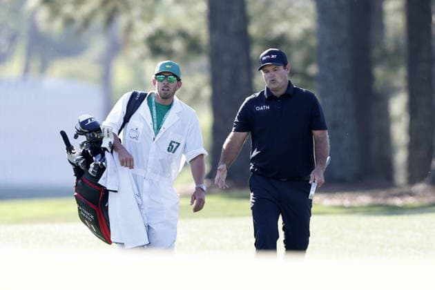 Golf 2026 Masters Tournament - Round 2 Patrick Reed of USA (R) and his caddie Kessler Karain walk during Round 2 of the 2026 Masters tournament in August, Georgia, USA, 10 April 2026. Augusta United States  Copyright: xERIKxS.xLESSERx