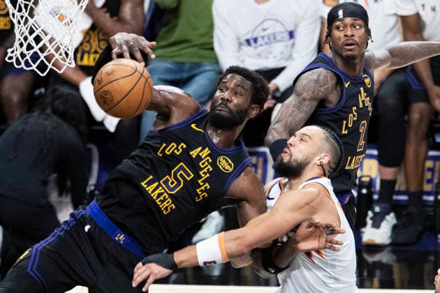 April 10, 2026, Los Angeles, California, USA: Los Angeles Lakers DEANDRE AYTON (5) and Phoenix Suns DILLON BROOKS (3) vie for the rebound during an NBA, Basketball Herren, USA basketball game at Crypto.com Arena on Friday in Los Angeles. Los Angeles USA - ZUMAc68_ 20260410_zaf_c68_035 Copyright: xRingoxChiux