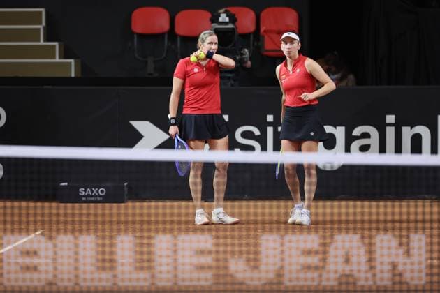 Belgian Magali Kempen and Belgian Greet Minnen pictured during the third game, a double game between Belgian pair Kempen Minnen and US pair McNally Melichar on the second day of the qualifiers of the Billie Jean King Cup tennis between Belgium and the USA, in Oostende, Belgium, on . The meeting takes place on 10 and 11th April. PHOTO BENOITxDOPPAGNE  x170473412x