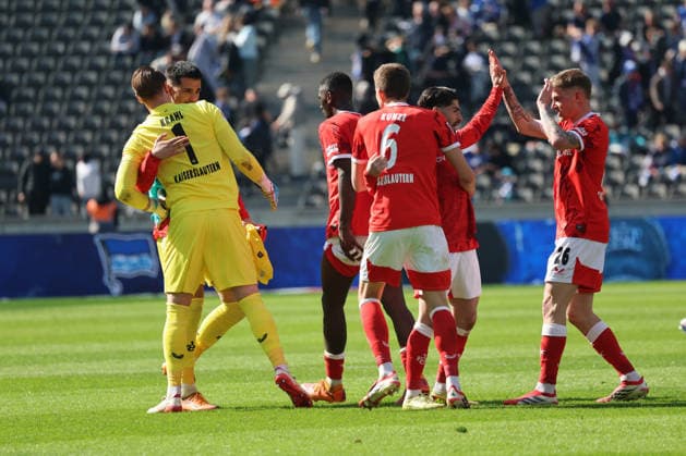 BERLIN, DEUTSCHLAND - APRIL 11: final whistle, end of game, victory, Torwart Goal Keeper Julian Krahl (Kaiserslautern, 1), Fabian Kunze (Kaiserslautern, 6), Paul Joly (Kaiserslautern, 26) celebrate the victory at the end of the match, during the match in the 2. German Bundesliga: Hertha BSC - 1. FC Kaiserslautern at Olympiastadion on matchday 29 on April 11, 2026 in Berlin, Deutschland. DFB regulations prohibit any use of photographs as image sequences and or quasi video. Berlin Deutschland Copyright: xO.Frankex