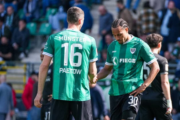 Deutschland: Fussball 2. Bundesliga, Saison 2025 26, 29. Spieltag, Preußen Münster vs SpVgg Greuther Fürth, 11.04.2026, LVM Preußenstadion (Münster, Nordrhein-Westfalen) Torge Paetow (Preußen Münster, 16) Etienne Amenyido (Preußen Münster, 30)