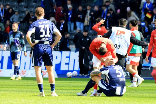 DEU, DFL, 2. FBL, Hertha BSC vs. 1.FC Kaiserslautern, 11.04.2026, Berliner Olympiastadion, Berlin, DEU, DFL, 2. FBL, Hertha BSC vs. 1.FC Kaiserslautern, im Bild Toni Leistner (Hertha BSC Berlin 37), Marton Dardai (Hertha BSC Berlin 31), Kenny Prince Redondo (1.FC Kaiserslautern 11) DFL - regulations prohibit any use of Photographs as image sequences and or quasi-video