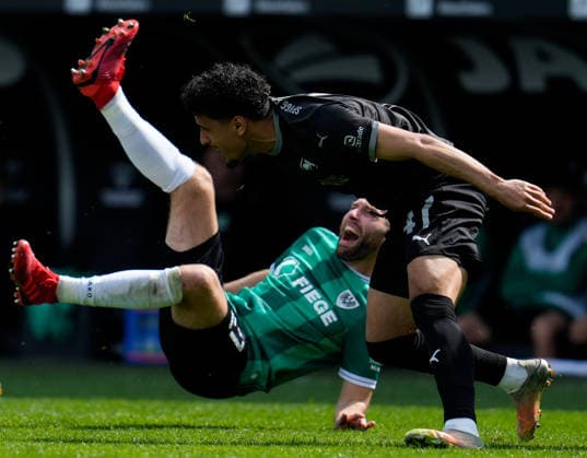 April 11, 2026, Muenster, Germany: SpVgg Greuther Fuerth forward SAYFALLAH LTAIEF (47) and SC Preussen Muenster midfielder RICO PREISSINGER (21) during the match between SC Pruessen Muenster and SpVgg Greuther Fuerth in the 2. Bundesliga on April 11, 2026, in Muenster, Germany...DFL REGULATIONS PROHIBIT ANY USE OF PHOTOGRAPHS AS IMAGE SEQUENCES AND OR QUASI-VIDEO Soccer 2026: Pruessen Muenster 0:0 SpVgg Greuther Fuerth  - ZUMAc201 20260411_zap_c201_029 Copyright: xScottxColemanx