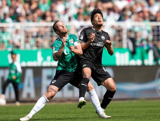 April 11, 2026, Muenster, Germany: SC Preussen Muenster midfielder JORRIT HENDRIX (20) works against SpVgg Greuther Fuerth forward SAYFALLAH LTAIEF (47) during the match between SC Pruessen Muenster and SpVgg Greuther Fuerth in the 2. Bundesliga on April 11, 2026, in Muenster, Germany...DFL REGULATIONS PROHIBIT ANY USE OF PHOTOGRAPHS AS IMAGE SEQUENCES AND OR QUASI-VIDEO Soccer 2026: Pruessen Muenster 0:0 SpVgg Greuther Fuerth  - ZUMAc201 20260411_zap_c201_030 Copyright: xScottxColemanx