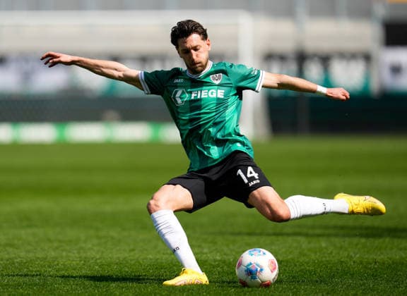 April 11, 2026, Muenster, Germany: SC Preussen Muenster midfielder HARALAMBOS MAKRIDIS (14) passes the ball during the match between SC Pruessen Muenster and SpVgg Greuther Fuerth in the 2. Bundesliga on April 11, 2026, in Muenster, Germany...DFL REGULATIONS PROHIBIT ANY USE OF PHOTOGRAPHS AS IMAGE SEQUENCES AND OR QUASI-VIDEO Muenster Germany - ZUMAc201 20260411_zap_c201_038 Copyright: xScottxColemanx