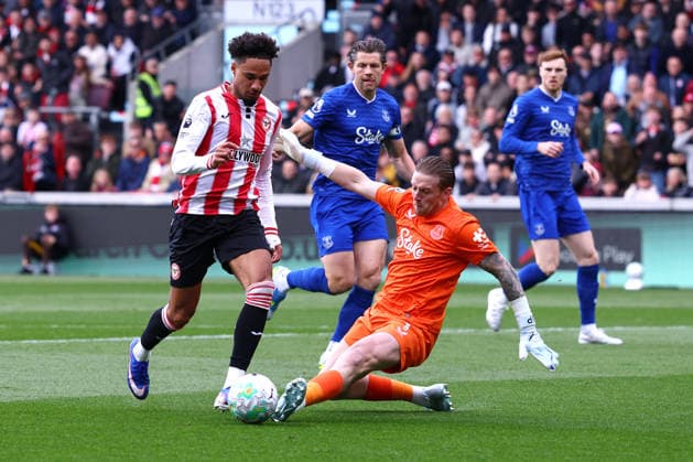 London, England, 11th April 2026. Kevin Schade of Brentford is fouled by Jordan Pickford of Everton and wins a penalty during the Brentford vs Everton Premier League match at Gtech Community Stadium, London. Picture credit should read: Paul Terry Sportimage EDITORIAL USE ONLY. No use with unauthorised audio, video, data, fixture lists, club league logos or live services. Online in-match use limited to 120 images, no video emulation. No use in betting, games or single club league player publications. SPI_018_PT_Brentford_Everton SPI-4678-0018
