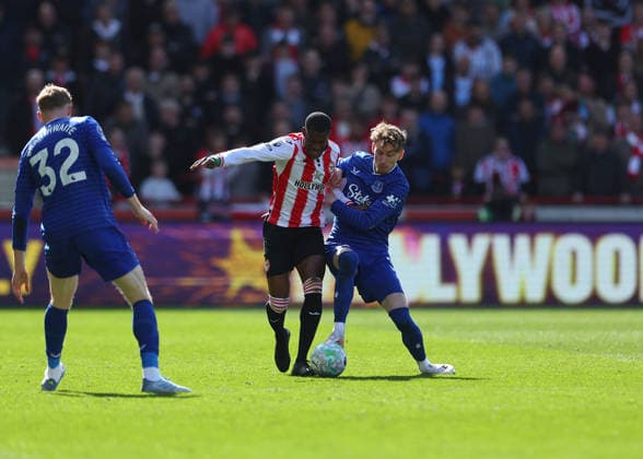 11th April 2026; Gtech Community Stadium, Brentford, London, England; Premier League Football, Brentford versus Everton; Dango Ouattara of Brentford under pressure from James Garner of Everton JPxFletcher
