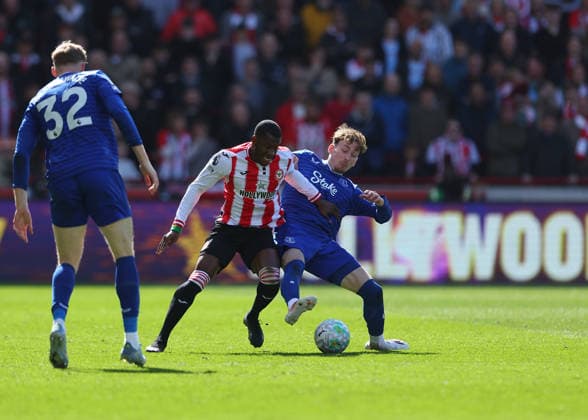 11th April 2026; Gtech Community Stadium, Brentford, London, England; Premier League Football, Brentford versus Everton; Dango Ouattara of Brentford under pressure from James Garner of Everton JPxFletcher