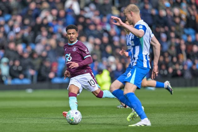 11th April 2026; Turf Moor, Burnley, Lancashire, England; Premier League Football, Burnley versus Brighton and Hove Albion; Marcus Edwards of Burnley looks to take on Jan Paul van Hecke of Brighton and Hove Albion LeexDurkin