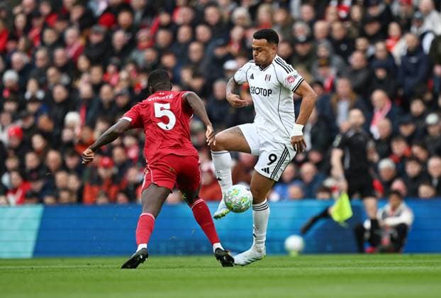 Ibrahima Konatà of Liverpool and Rodrigo Muniz of Fulham Liverpool v Fulham, Premier League, Football, Anfield, Liverpool, UK - 11 Apr 2026Liverpool Anfield United Kingdom EDITORIAL USE ONLY No use with unauthorised audio, video, data, fixture lists, club league logos or live services. Online in-match use limited to 120 images, no video emulation. No use in betting, games or single club league player publications. Copyright: xAnnaxGowthorpe Shutterstockx 16823590am