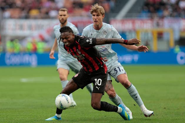 April 11, 2026, Milan, Lombardia, Italy: AC MilanÃ¢â‚¬â ¢s RAFAEL LEAO in action against UdineseÃ¢â‚¬â ¢s THOMAS KRISTENSEN during the Italian Serie A Enilive soccer championship football match between AC Milan and Udinese Calcio at San Siro Stadium on April 11th, 2026, Milan, Italy Milan Italy - ZUMAr199 20260411_zsp_r199_031 Copyright: xMattiaxRadonix
