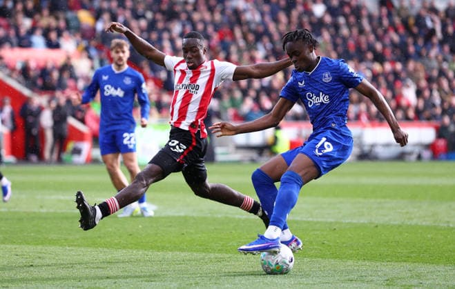 London, England, 11th April 2026. Michael Kayode of Brentford Tyrique George of Everton challenge for the ball during the Brentford vs Everton Premier League match at Gtech Community Stadium, London. Picture credit should read: Paul Terry Sportimage EDITORIAL USE ONLY. No use with unauthorised audio, video, data, fixture lists, club league logos or live services. Online in-match use limited to 120 images, no video emulation. No use in betting, games or single club league player publications. SPI_059_PT_Brentford_Everton SPI-4678-0059