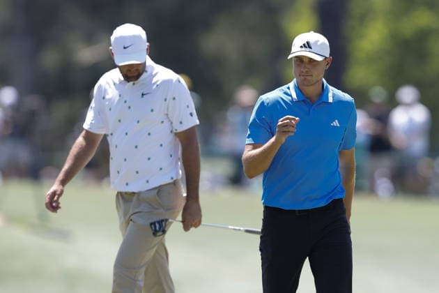 Golf 2026 Masters Tournament - Round 3 Ludvig Aberg of Sweden (R) reacts after a birdie putt on the third green as Scottie Scheffler of the US (L) walks by in Round 3 of the 2026 Masters tournament in August, Georgia, USA, 11 April 2026. Augusta United States  Copyright: xERIKxS.xLESSERx