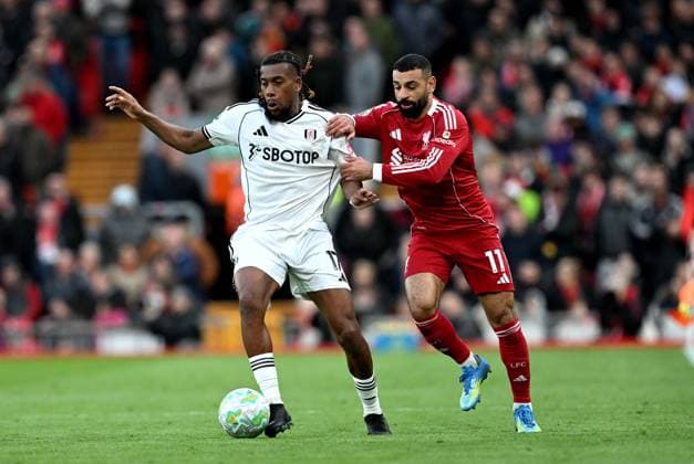 Alex Iwobi of Fulham and Mohamed Salah of Liverpool Liverpool v Fulham, Premier League, Football, Anfield, Liverpool, UK - 11 Apr 2026Liverpool Anfield United Kingdom EDITORIAL USE ONLY No use with unauthorised audio, video, data, fixture lists, club league logos or live services. Online in-match use limited to 120 images, no video emulation. No use in betting, games or single club league player publications.  Copyright: xAnnaxGowthorpe Shutterstockx 16823590bi