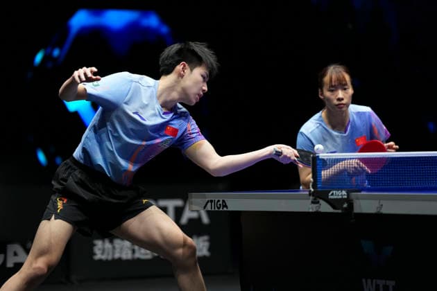 (260411) -- TAIYUAN, April 11, 2026 -- Huang Youzheng (L) Shi Xunyao of China compete during the mixed doubles final match against Wong Chun Ting Doo Hoi Kem of China s Hong Kong at the World Table tennis, Tischtennis (WTT) Contender Taiyuan 2026 in Taiyuan, north China s Shanxi Province, April 11, 2026. ) (SP)CHINA-TAIYUAN-TABLE TENNIS-WTT CONTENDER TAIYUAN 2026 (CN) YangxChenguang 