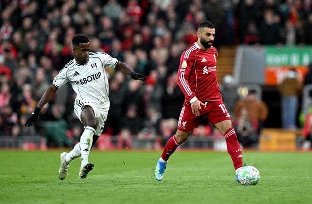 Ryan Sessegnon of Fulham and Mohamed Salah of Liverpool Liverpool v Fulham, Premier League, Football, Anfield, Liverpool, UK - 11 Apr 2026Liverpool Anfield United Kingdom EDITORIAL USE ONLY No use with unauthorised audio, video, data, fixture lists, club league logos or live services. Online in-match use limited to 120 images, no video emulation. No use in betting, games or single club league player publications.  Copyright: xAnnaxGowthorpe Shutterstockx 16823590bn