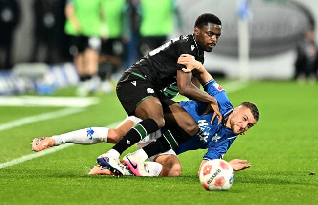11.04.2026, xfux, Fussball 2.Bundesliga, SV Darmstadt 98 - Hannover 96 v.l. Noel Aseko (Hannover 96), Fabian Nürnberger Nuernberger (SV Darmstadt 98) (DFL DFB REGULATIONS PROHIBIT ANY USE OF PHOTOGRAPHS as IMAGE SEQUENCES and or QUASI-VIDEO) Darmstadt