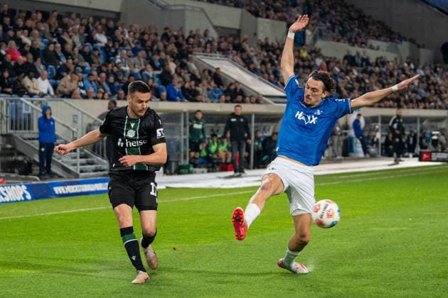 2. Bundesliga: SV Darmstadt 98 vs Hannover 96, 11.04.2026 Zweikampf zwischen Bastian Allgeier (Hannover 96, 17) und Fraser Hornby (SV Darmstadt 98, 9) 2. Bundesliga: SV Darmstadt 98 vs Hannover 96, Merck-Stadion am Böllenfalltor, 11.04.2026 DFB DFL REGULATIONS PROHIBIT ANY USE OF PHOTOGRAPHS AS IMAGE SEQUENCES AND OR QUASI-VIDEO.