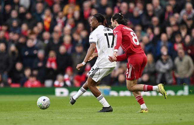 Alex Iwobi of Fulham and Dominik Szoboszlai of Liverpool Liverpool v Fulham, Premier League, Football, Anfield, Liverpool, UK - 11 Apr 2026Liverpool Anfield United Kingdom EDITORIAL USE ONLY No use with unauthorised audio, video, data, fixture lists, club league logos or live services. Online in-match use limited to 120 images, no video emulation. No use in betting, games or single club league player publications.  Copyright: xAnnaxGowthorpe Shutterstockx 16823590ce