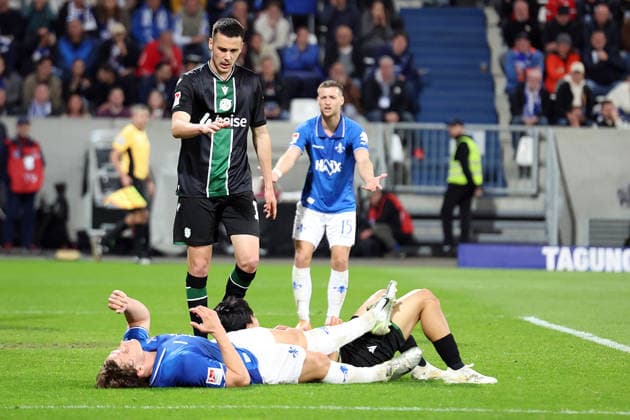 11.04.2026, xrekx, Fussball 2.Bundesliga, SV Darmstadt 98 - Hannover 96 v.l. Fynn Lakenmacher (SV Darmstadt 98) Bastian Allgeier (Hannover 96) Hayate Matsuda (Hannover 96) Fabian Nürnberger Nuernberger (SV Darmstadt 98) (DFL DFB REGULATIONS PROHIBIT ANY USE OF PHOTOGRAPHS as IMAGE SEQUENCES and or QUASI-VIDEO) Darmstadt
