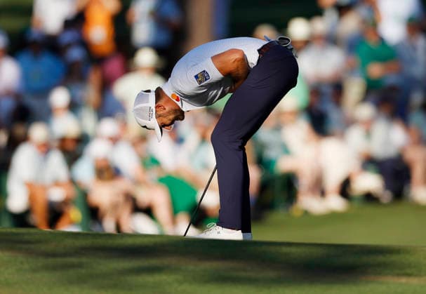 Sam Burns reacts after missing a birdie putt on the 15th green during the third round of the Masters Tournament at Augusta National Golf Club on Saturday, April 11, 2026, in Augusta, Georgia.  AUG20260411859 JOHNxANGELILLO