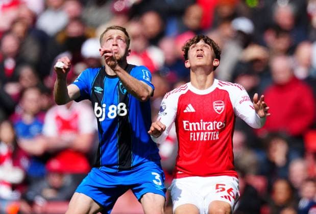 Adrien Truffert of Bournemouth and Max Dowman of Arsenal Arsenal v AFC Bournemouth, Premier League, Football, Emirates Stadium, London, UK - 11 Apr 2026London Emirates Stadium United Kingdom EDITORIAL USE ONLY No use with unauthorised audio, video, data, fixture lists, club league logos or live services. Online in-match use limited to 120 images, no video emulation. No use in betting, games or single club league player publications. Copyright: xJavierxGarcia Shutterstockx 16823522jq