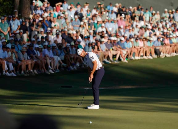 Sam Burns putts on the 16th green during the third round of the Masters Tournament at Augusta National Golf Club on Saturday, April 11, 2026, in Augusta, Georgia.  AUG202604118562 JOHNxANGELILLO