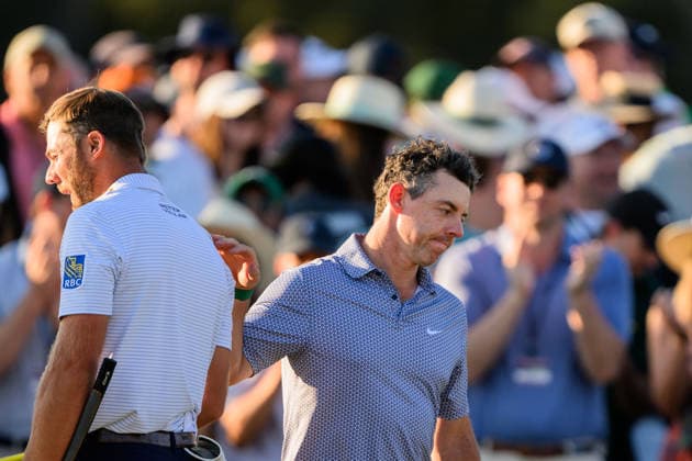 260411 Sam Burns of United States and Rory McIlroy of Northern Ireland on the 18th green after the third round of the 2026 Masters Golf Tournament on April 11, 2026 in Augusta. Photo: Petter Arvidson BILDBYRAN kod PA PA1195 golf masters bbeng the masters augusta depp Copyright: PETTERxARVIDSON BB260411PA128