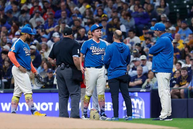 MILWAUKEE, WI - APRIL 11: Milwaukee Brewers pitcher Kyle Harrison (52) is attended to by medical staff after being stepped on during a game between the Milwaukee Brewers and the Washington Nationals at American Family Field on April 11, 2026, in Milwaukee, WI. (Photo by Larry Radloff Icon Sportswire) MLB, Baseball Herren, USA APR 11 Nationals at Brewers EDITORIAL USE ONLY Icon2604110300