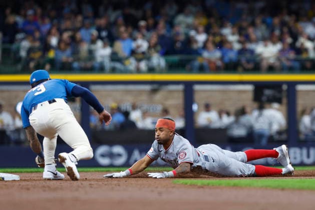 MILWAUKEE, WI - APRIL 11: Washington Nationals shortstop Nasim Nunez (26) slides into the waiting tag of Milwaukee Brewers shortstop Joey Ortiz (3) during a game between the Milwaukee Brewers and the Washington Nationals at American Family Field on April 11, 2026, in Milwaukee, WI. (Photo by Larry Radloff Icon Sportswire) MLB, Baseball Herren, USA APR 11 Nationals at Brewers EDITORIAL USE ONLY Icon2604110931
