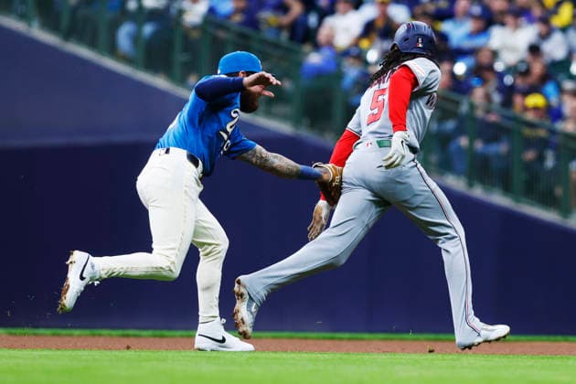 MILWAUKEE, WI - APRIL 11: Milwaukee Brewers shortstop Joey Ortiz (3) tags out Washington Nationals shortstop CJ Abrams (5) during a game between the Milwaukee Brewers and the Washington Nationals at American Family Field on April 11, 2026, in Milwaukee, WI. (Photo by Larry Radloff Icon Sportswire) MLB, Baseball Herren, USA APR 11 Nationals at Brewers EDITORIAL USE ONLY Icon2604111255