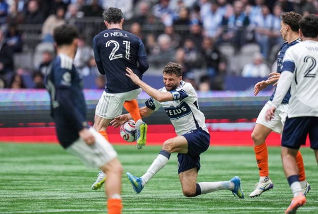 April 11, 2026, Vancouver, Bc, CANADA: Vancouver Whitecaps Thomas Muller, centre right, and New York City FC s Aiden O Neill (21) collide during the second half of an MLS, Fussball Herren, USA soccer match, in Vancouver, on Saturday, April 11, 2026. Canada News - April 11, 2026  - ZUMAc35_ 20260411_zaf_c35_149 Copyright: xDarrylxDyckx