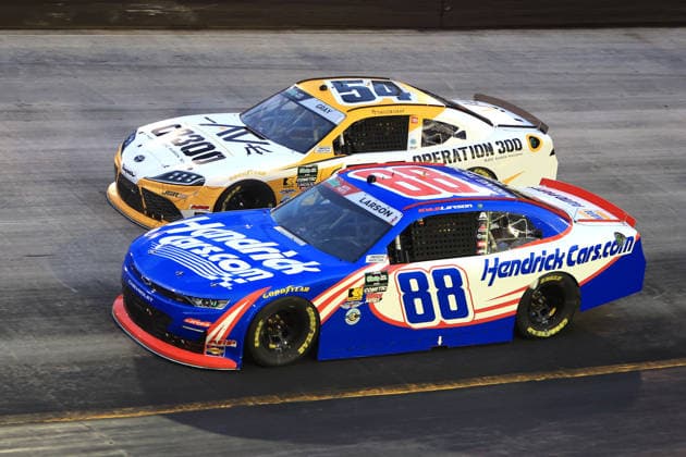 BRISTOL, TN - APRIL 11: Kyle Larson ( 88 JR Motorsports HendrickCars.com Chevrolet) races with Taylor Gray ( 54 Joe Gibbs Racing Operation 300 Toyota) in turn 2 during the running of the NASCAR, Motorsport, USA O Reilly Auto Parts Series Suburban Propane 300 on April 11, 2026 at Bristol Motor Speedway in Bristol, TN. (Photo by Jeff Robinson Icon Sportswire) AUTO: APR 11 NASCAR O’Reilly Auto Parts Series Suburban Propane 300 EDITORIAL USE ONLY Icon2604112604300