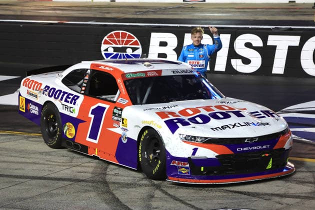 BRISTOL, TN - APRIL 11: Connor Zilisch ( 1 JR Motorsports Roto-Rooter Chevrolet) waves to the fans after winning the NASCAR, Motorsport, USA O Reilly Auto Parts Series Suburban Propane 300 on April 11, 2026 at Bristol Motor Speedway in Bristol, TN. (Photo by Jeff Robinson Icon Sportswire) AUTO: APR 11 NASCAR O’Reilly Auto Parts Series Suburban Propane 300 EDITORIAL USE ONLY Icon2604113383300