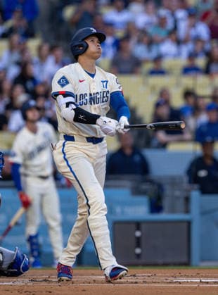April 11, 2026, Los Angeles, California, USA: Los Angeles Dodger SHOHEI OHTANI watches his leadoff homerun against the Texas Rangers at Dodger Stadium. The Dodgers went on to win the game 6-3. Los Angeles USA - ZUMAh234 20260411_zsp_h234_004 Copyright: xMarkxEdwardxHarrisx