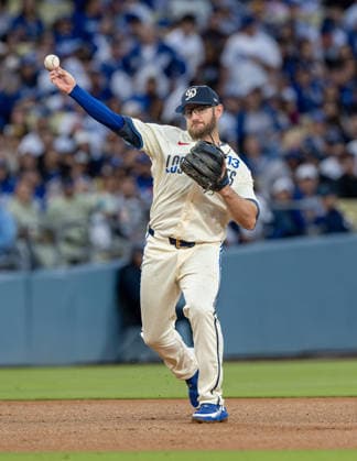 April 11, 2026, Los Angeles, California, USA: Los Angeles Dodger MAX MUNCY throughs out a Texas Rangers runner at Dodger Stadium. The Dodgers won the game 6-3. News - April 11, 2026  - ZUMAh234 20260411_zsp_h234_015 Copyright: xMarkxEdwardxHarrisx