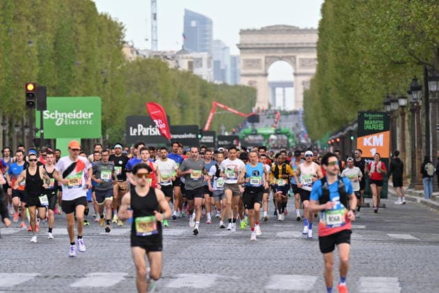 49th Paris Marathon PARIS, FRANCE - APRIL 12: Participants compete during the 49th Paris Marathon in Paris, France on April 12, 2026. The Paris International Marathon is an annual marathon which takes place from the Champs-Elysees heading towards the Eiffel Tower, Notre-Dame Cathedral, and the Arc de Triomphe. Mustafa Yalcin Anadolu Paris France. Editorial use only. Please get in touch for any other usage.  Copyright: x2026xAnadoluxMustafaxYalcinx