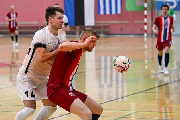 (260412) -- JOHVI, April 12, 2026 -- Edwin Stuf (L) of Estonia vies with Sindre Myrvold Welo of Norway during the preliminary qualifying round of the 2028 FIFA Futsal World Cup Group F match between Estonia and Norway in Johvi, Estonia, April 11, 2026. (Photo by Xinhua) (SP)ESTONIA-JOHVI-FIFA FUTSAL WORLD CUP-PRELIMINARY QUALIFYING ROUND SergeixStepanov 