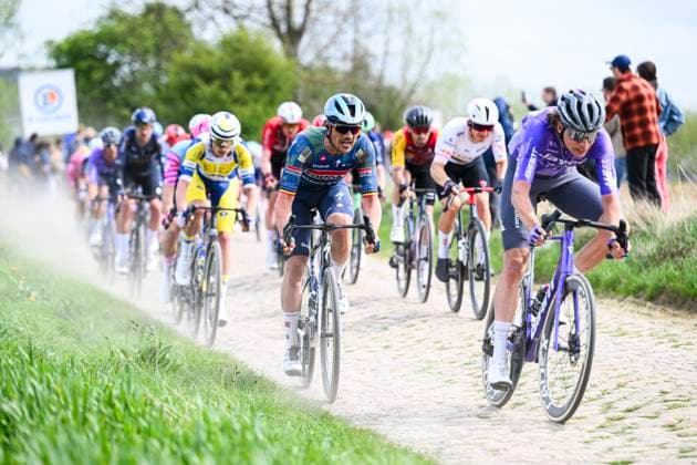 Paris - Roubaix Hauts-de-France 2026 Cycling Race ROUBAIX, FRANCE - APRIL 12 : Lampaert Yves (BEL) of Soudal Quick Step in action during the 123rd edition of Paris - Roubaix Hauts-de-France an UCI World Tour 1.UWT one day cycling road race for Men Elite of 258 km with start in Compiegne and finish in Roubaix on April 12, 2026 in Roubaix, France, 12 04 2026 ( Motordriver Kenny Verfaillie - Roubaix France  Copyright: xVincentxKalutx